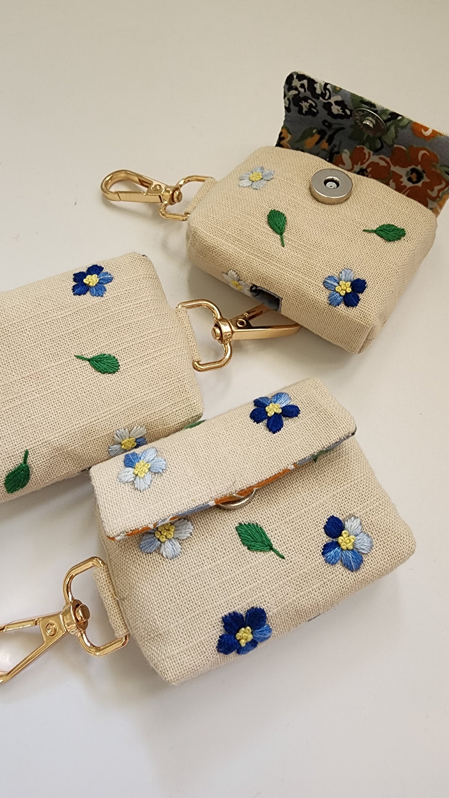 Ikali - Blue Flowers - Hand-embroidered Earpod Pouch