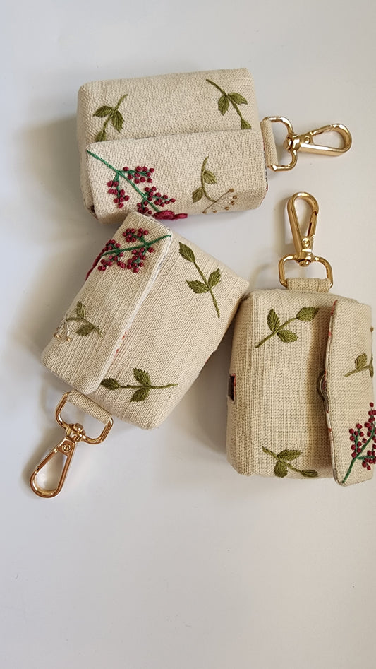 Ikali - Scattered Flowers - Hand-embroidered Earpod Pouch