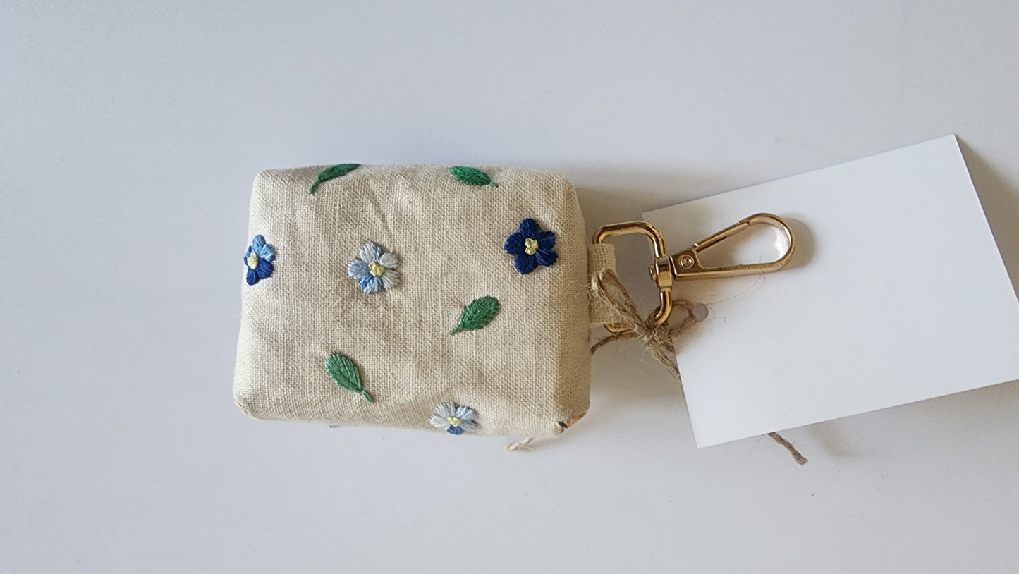 Ikali - Blue Flowers - Hand-embroidered Earpod Pouch