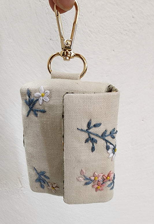 Ikali - Grey Flowers - Hand-embroidered Earpod Pouch