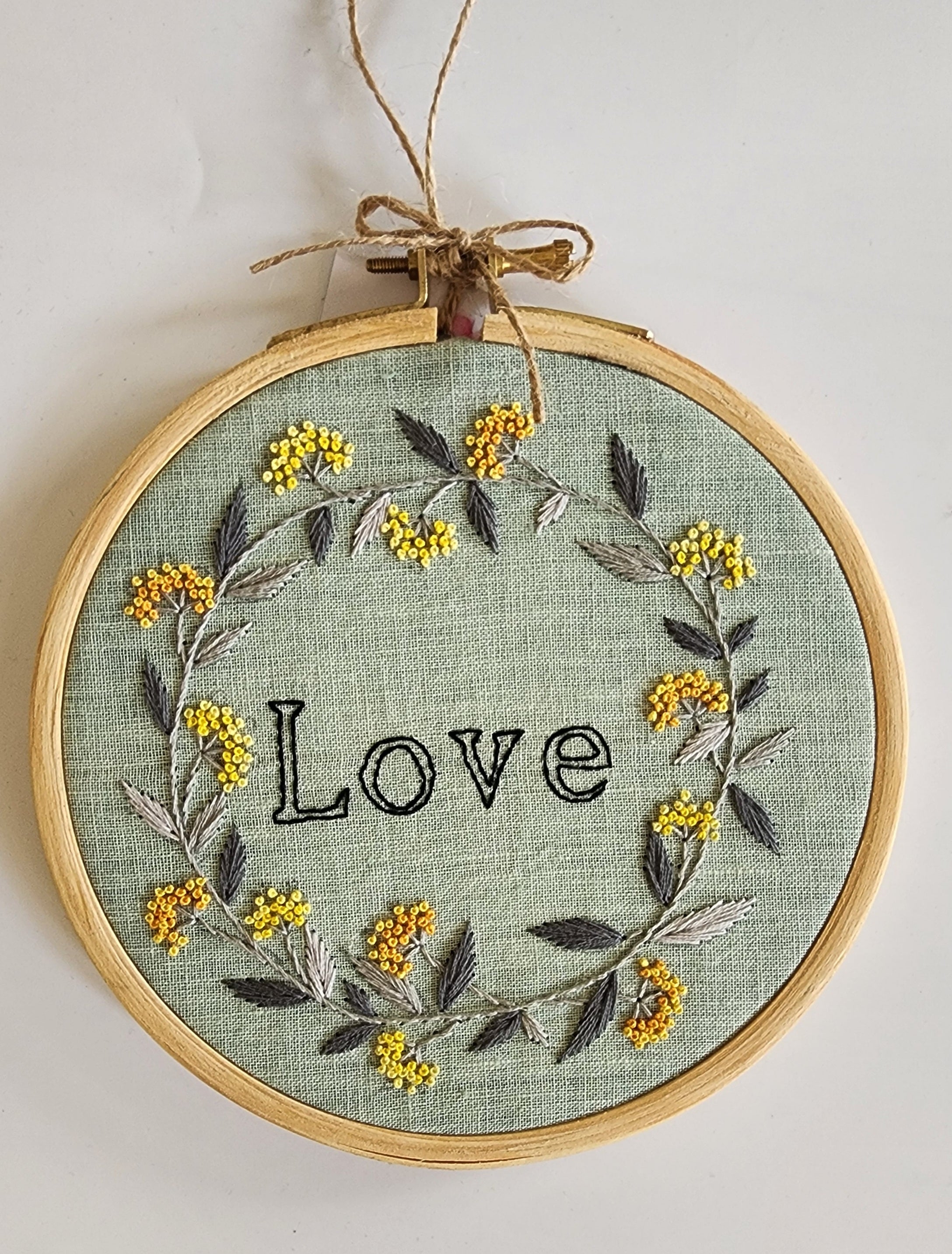 Embroidery shop wall hanging