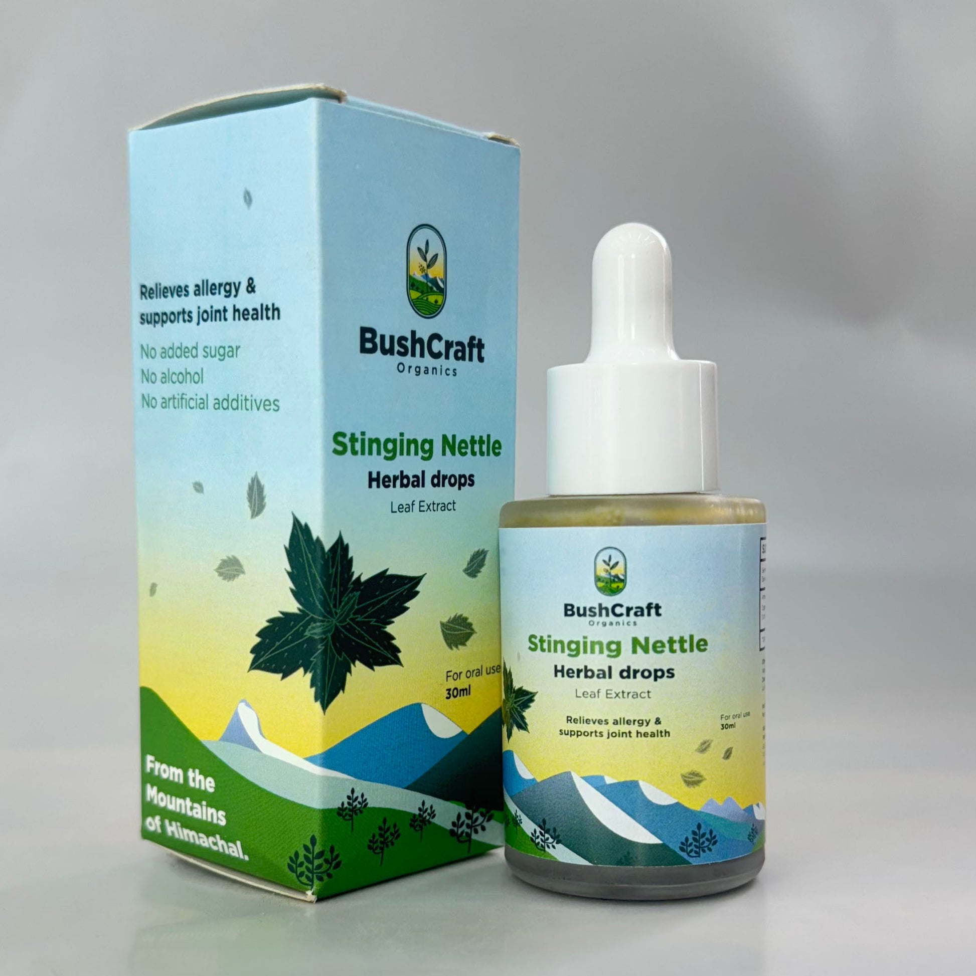 BushCraft Stinging Nettle Herbal drops packaging and bottle on a gray background